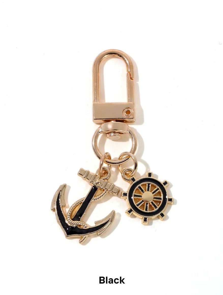 Anchor and wheel gold tone bag charm